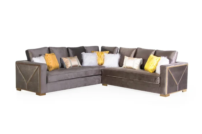 Sectional Sofa with Gold Trim and Plush Accent Pillows